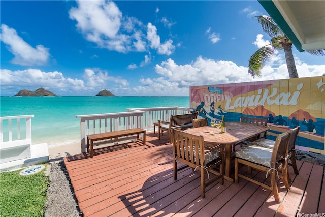 1276 Mokulua Dr, Kailua, HI 96734 - wooden deck featuring a water view and outdoor dining space