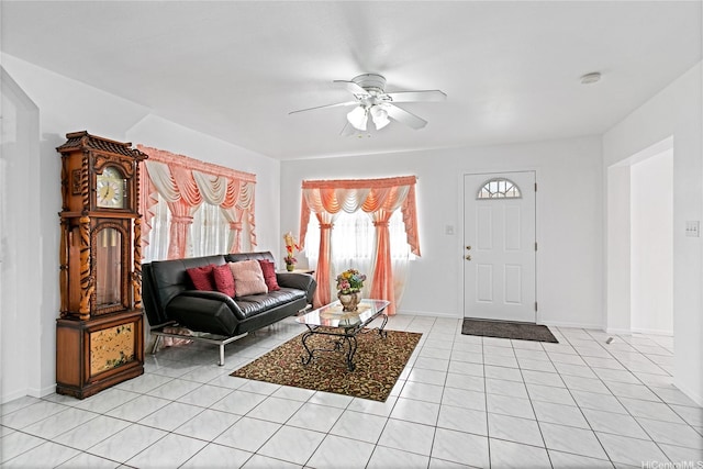 86-196 Moekolu St, Waianae, HI 96792 - living area featuring ceiling fan, light tile patterned floors, and baseboards