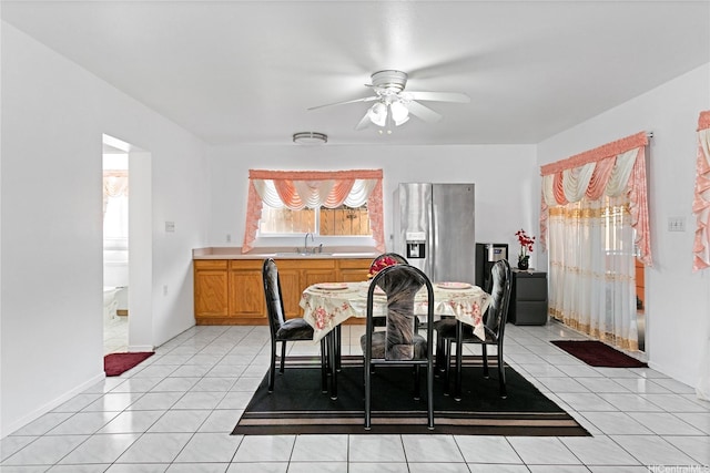 86-196 Moekolu St, Waianae, HI 96792 - dining space featuring a ceiling fan, light tile patterned floors, and baseboards