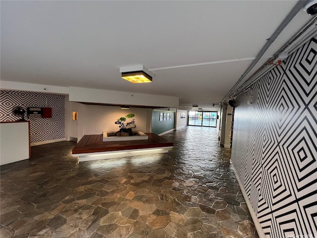2463 Kuhio Ave Unit 405, Honolulu, HI 96815 - hallway featuring stone floors