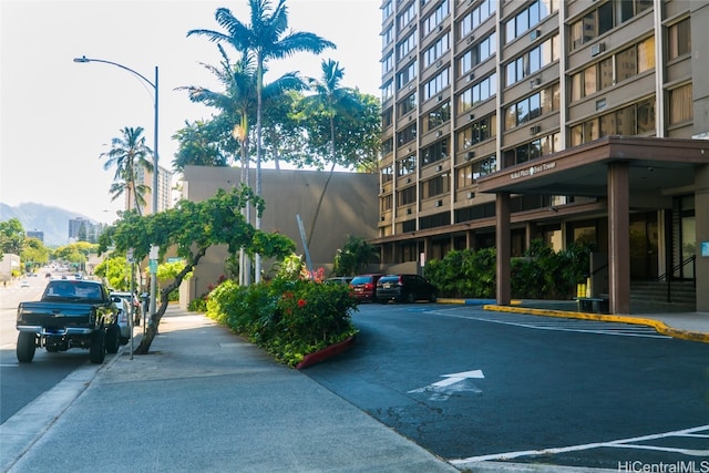 view of building exterior featuring a mountain view