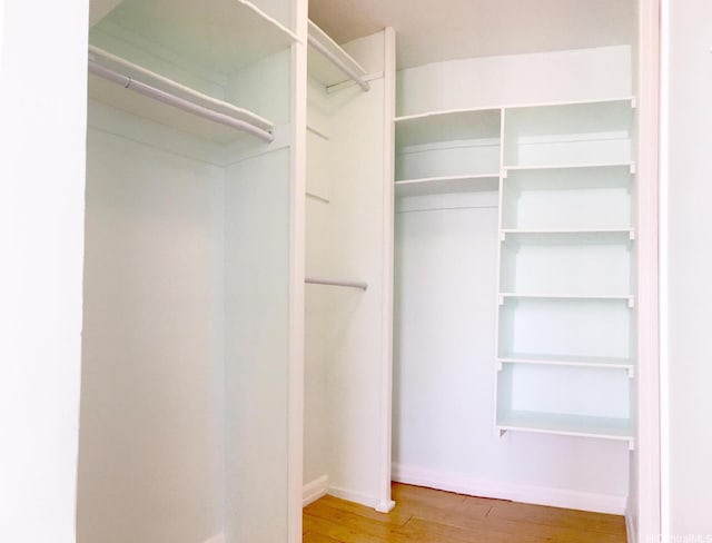 1925 Kalakaua Ave Unit 1902, Honolulu, HI 96815 - spacious closet featuring wood finished floors