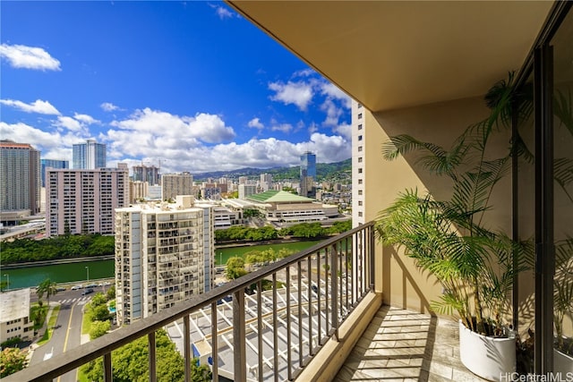 balcony featuring a water view