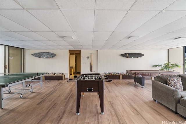 rec room featuring hardwood / wood-style floors, billiards, a paneled ceiling, and floor to ceiling windows