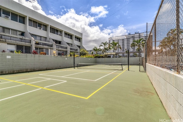 view of sport court featuring basketball hoop