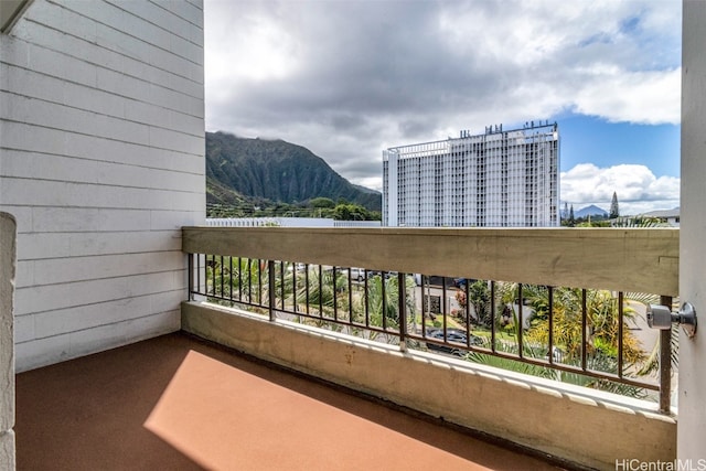 balcony featuring a mountain view