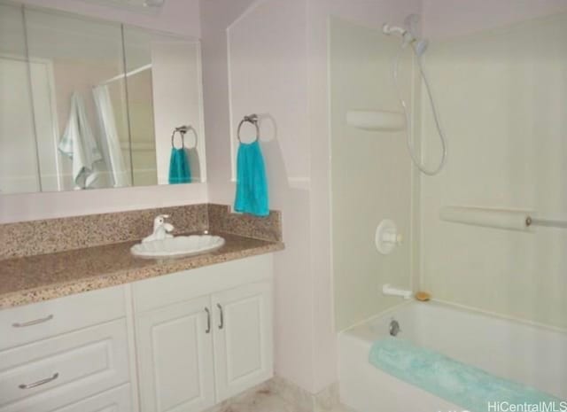 bathroom with vanity and shower / bathtub combination with curtain