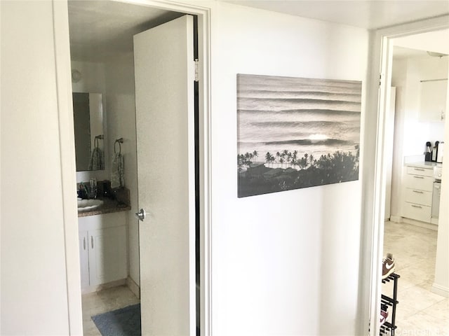 bathroom with tile patterned floors