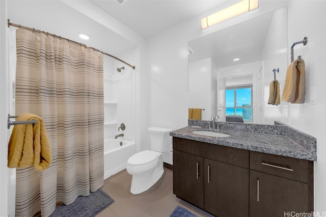 full bathroom with vanity, toilet, shower / bath combo, and tile patterned flooring