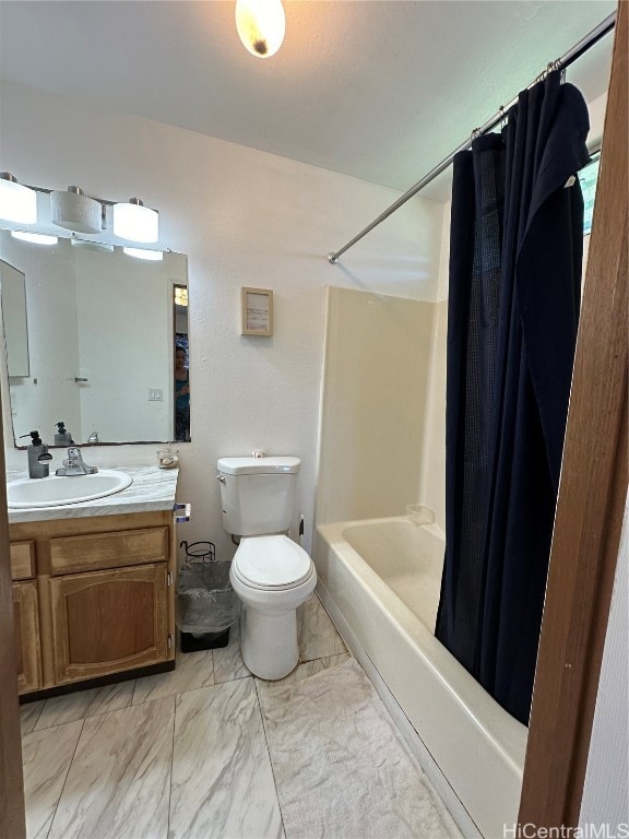 full bathroom featuring vanity, shower / bath combination with curtain, and toilet