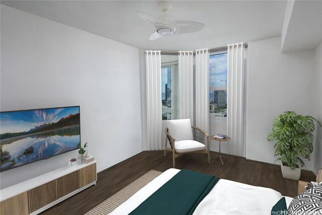 bedroom featuring ceiling fan and dark hardwood / wood-style flooring