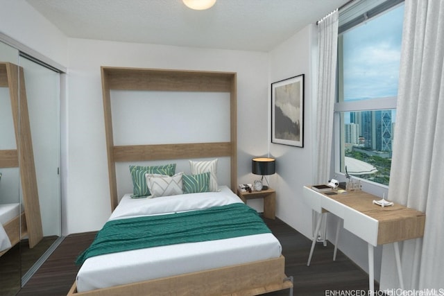 bedroom featuring dark hardwood / wood-style floors