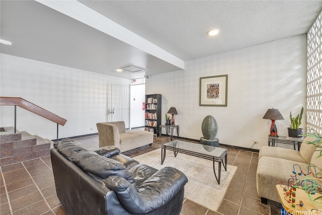 living room with a textured ceiling