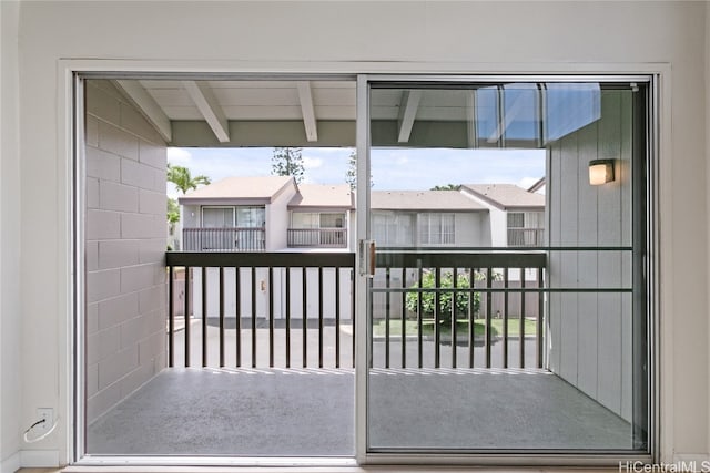 exterior space featuring beam ceiling