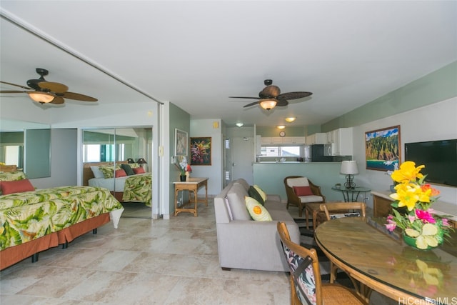 dining space featuring ceiling fan