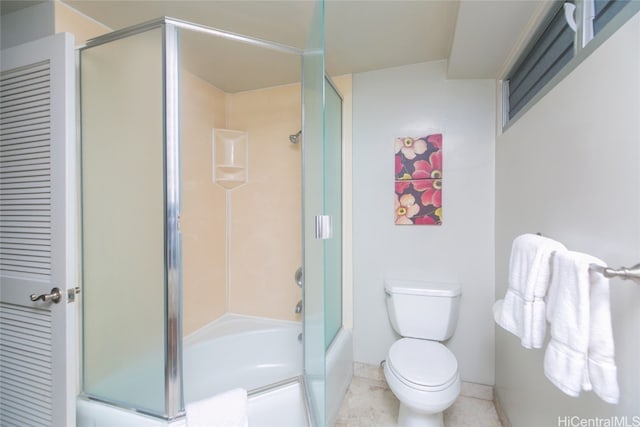 bathroom with bath / shower combo with glass door, toilet, and tile patterned flooring