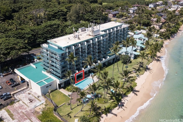 bird's eye view featuring a view of the beach and a water view