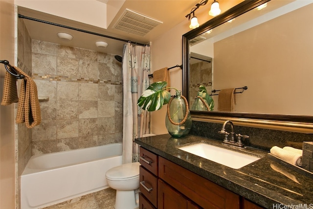 full bathroom with vanity, toilet, and shower / tub combo with curtain