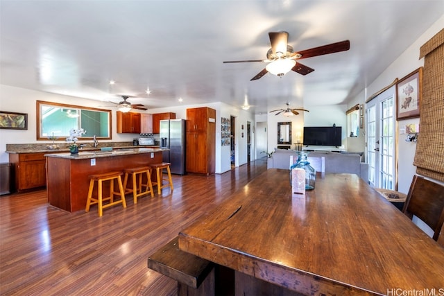 dining area featuring dark hardwood / wood-style flooring and french doors