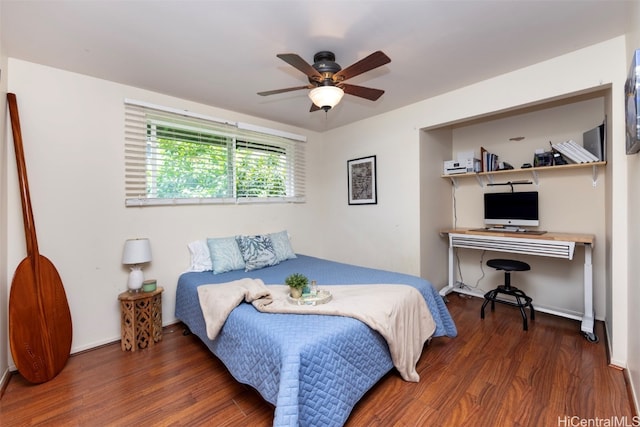 bedroom featuring ceiling fan and dark hardwood / wood-style floors