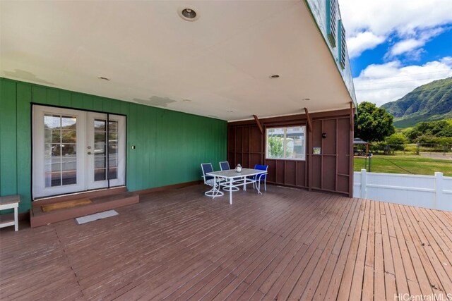 deck with a mountain view and french doors