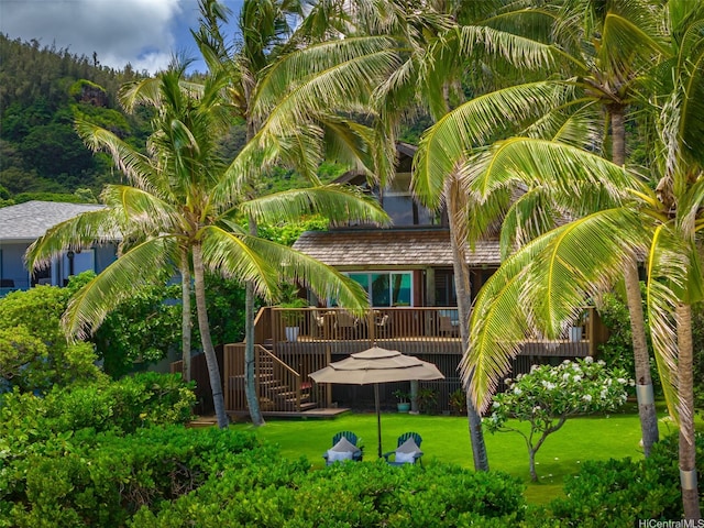 59-557 Ke Iki Rd Unit A, Haleiwa, HI 96712 - rear view of property with a wooden deck, a yard, and stairs