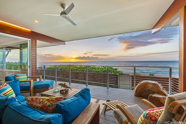 59-465 Kamehameha Hwy, Haleiwa, HI 96712 - balcony at dusk with outdoor lounge area, a water view, and a ceiling fan