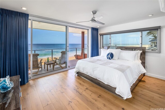 59-465 Kamehameha Hwy, Haleiwa, HI 96712 - bedroom featuring wood-type flooring, ceiling fan, a water view, and access to outside
