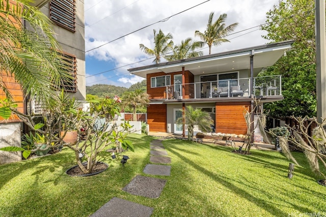 59-465 Kamehameha Hwy, Haleiwa, HI 96712 - back of house featuring a balcony and a yard