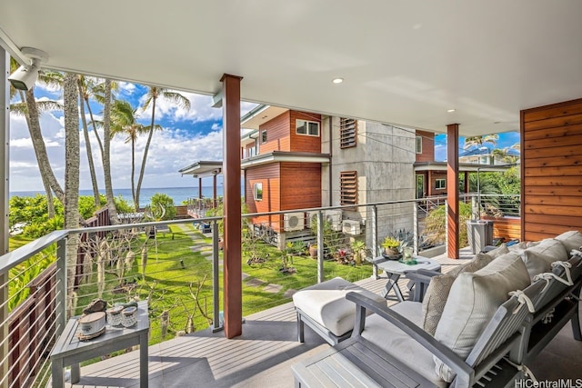 59-465 Kamehameha Hwy, Haleiwa, HI 96712 - balcony with an outdoor hangout area and a water view
