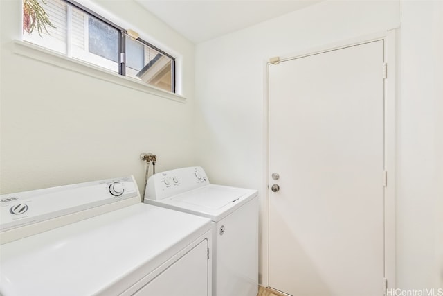 laundry room with washer and clothes dryer