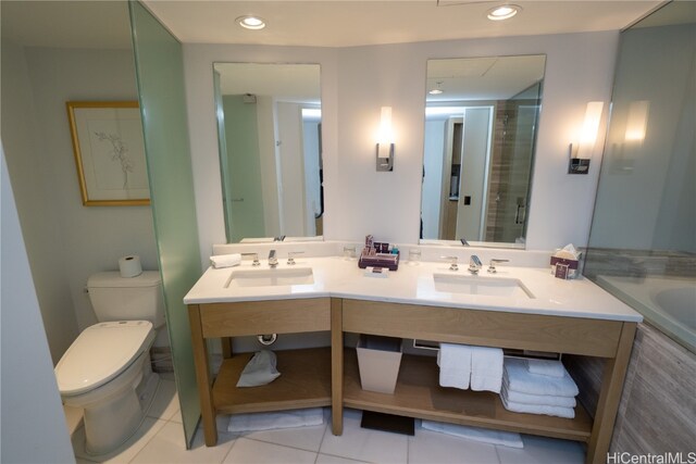 full bathroom with vanity, toilet, tile patterned floors, and shower with separate bathtub