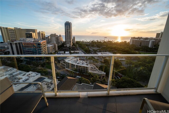 balcony at dusk with a water view