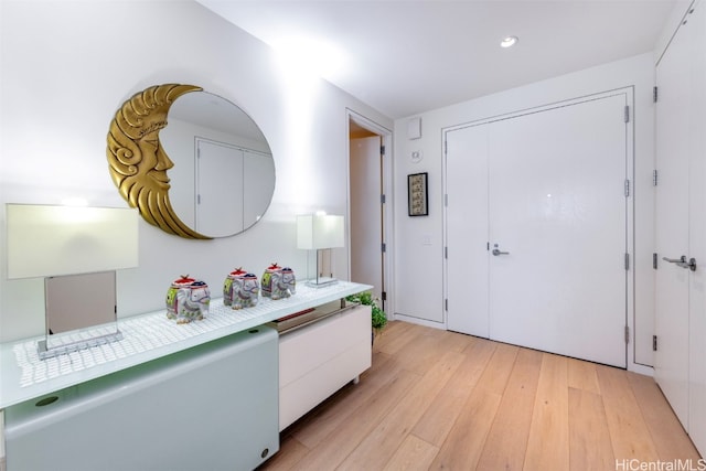 foyer with light wood-type flooring