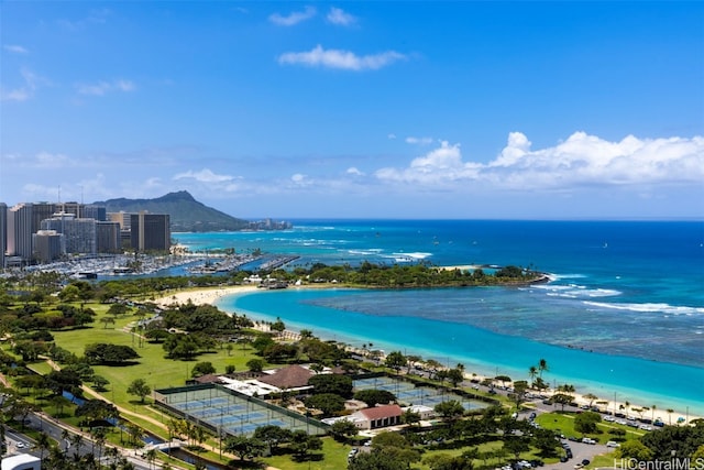 aerial view featuring a water and mountain view and a view of the beach