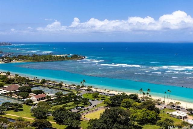 aerial view with a water view and a beach view