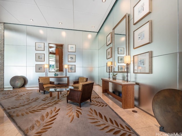 living area featuring light tile patterned flooring