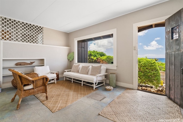 sitting room with a healthy amount of sunlight