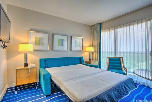 410 Atkinson Dr Unit 907, Honolulu, HI 96814 - bedroom featuring carpet floors and baseboards