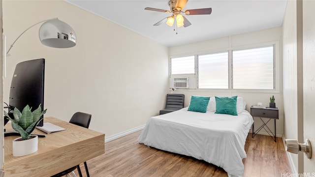 bedroom featuring ceiling fan and light wood-type flooring