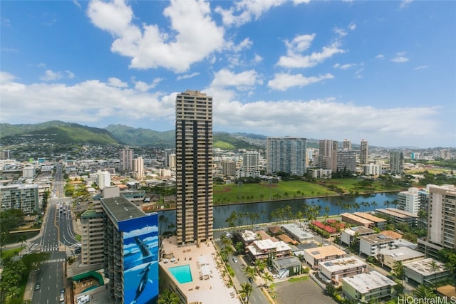 aerial view featuring a water and mountain view