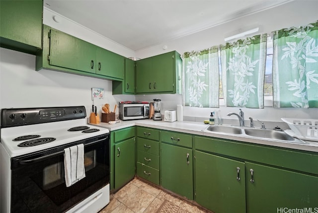 kitchen with light tile patterned flooring, white range with electric stovetop, green cabinets, and sink