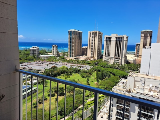 balcony featuring a water view