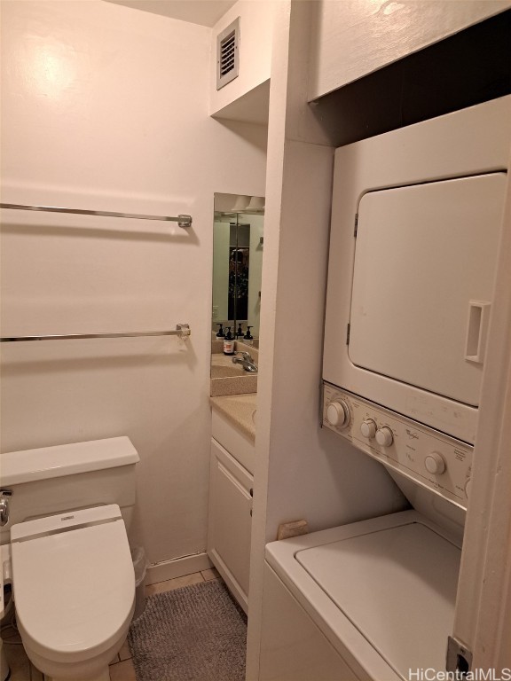 bathroom with tile patterned flooring and toilet