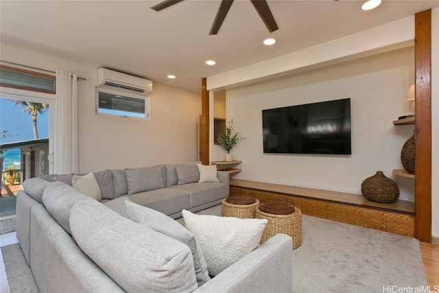 living room featuring a wall mounted AC and ceiling fan