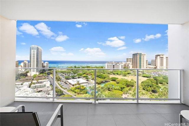 balcony featuring a water view