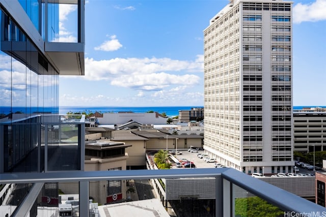 balcony featuring a water view