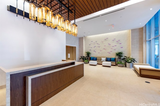 welcome area with a chandelier