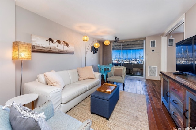 living room featuring dark hardwood / wood-style floors