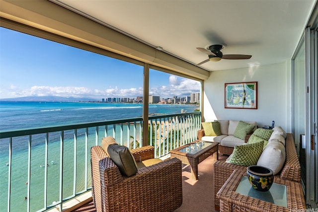 2877 Kalakaua Ave Unit 503/504, Honolulu, HI 96815 - balcony featuring a ceiling fan, view of water and beach, and outdoor lounge area